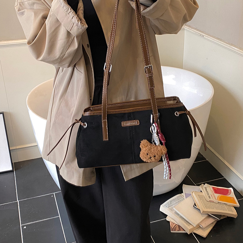 Bolsa de terciopelo coreana retro de seda para mujeres otoño / invierno 2025 nueva moda versátil bolso de hombro con brazo bolso de viaje