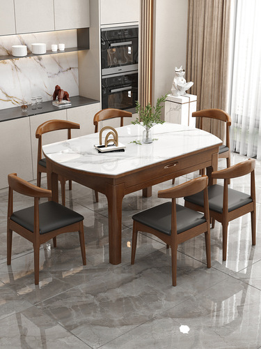 A solid wood and stone-top dining table for home use, small apartment, convertible round and square table with an electric stove, and adjustable extension table