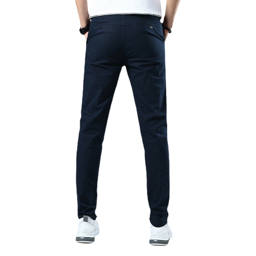Four Seasons pantalones casuales elásticos para hombres al por mayor de los hombres jóvenes estilo coreano SLIM-Fit adelgazamiento simple moda lápiz pantalones hombres