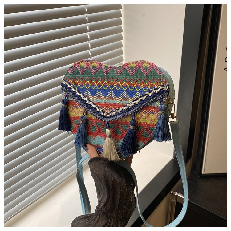 Mayorista bolsos de estilo nacional de mujer 2024 moda nueva mochila en forma de corazón bolsos de hombro bohemios transfronterizos