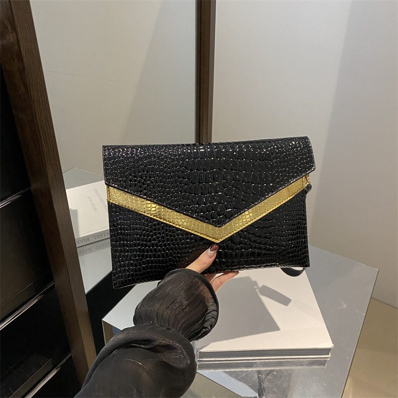 Bolso de mano sobre 2024 otoño nuevo estilo personalidad coreana moda femenina de moda temperamento casual todo-fósforo banquete pequeño bolso