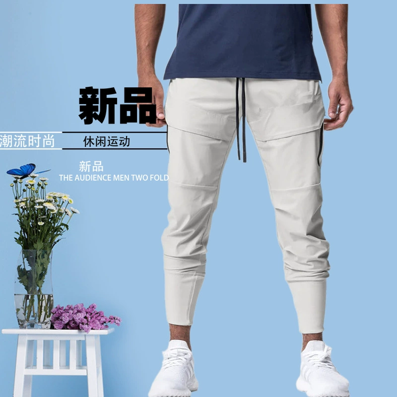 Летние мужские модные спортивные брюки-джоггеры, повседневные спортивные штаны с эластичной талией, множеством карманов, для фитнеса, бега и тренировок.