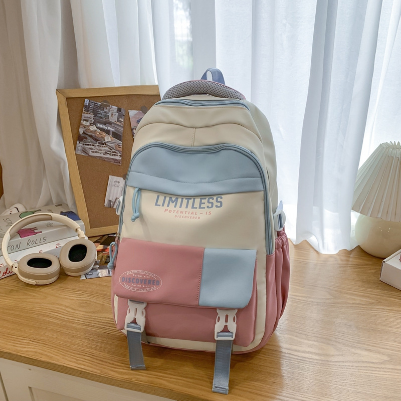 Mochilas escolares de alto valor facial nuevas estudiantes de primavera 2025 moda ligera y viajes al aire libre de gran capacidad con bolsos de hombro