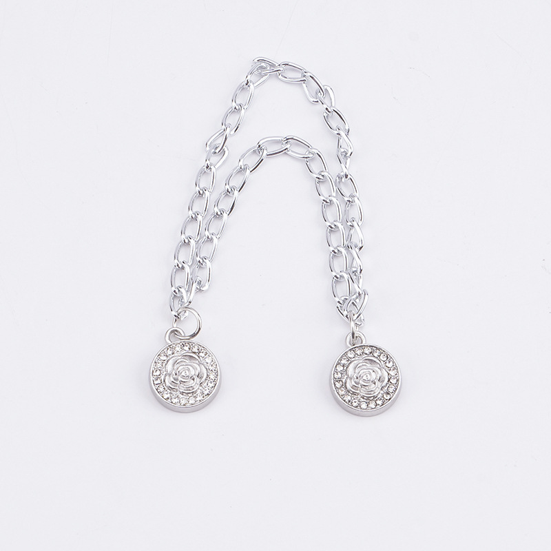 チェーンの磁気はズボンの足を引きずることを防ぎます。金属の磁気は袖口を固定します。