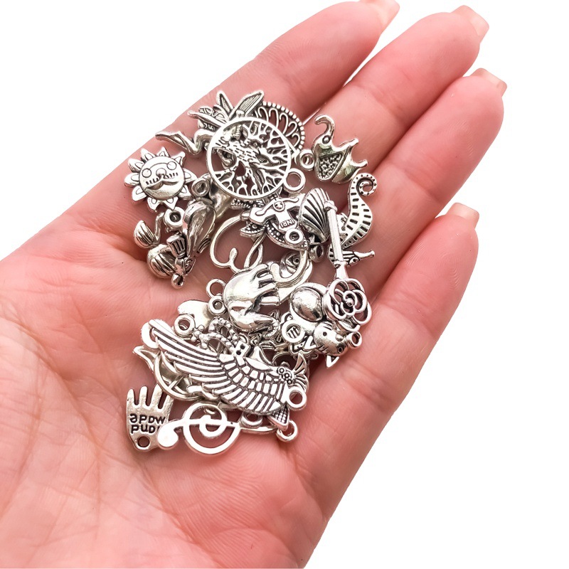 Cruz-frontera nuevo collar pulsera de aleación alas sol colgante hecho a mano DIY accesorios de la joyería 1 colgante de plata Xizanga