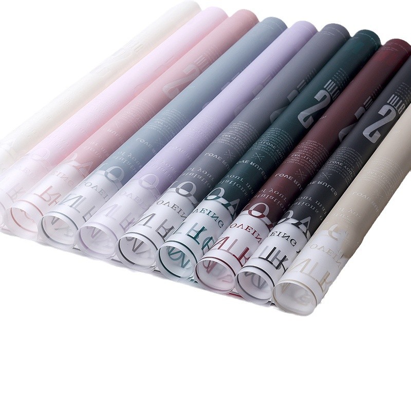 Fabricante de fiestas de flores al por mayor nuevo patrón de amor de San Valentín papel de embalaje de flores floristería translúcida ramo de flores