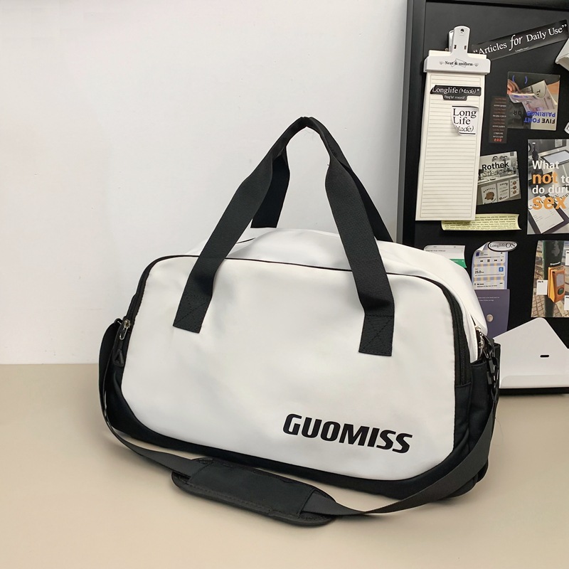 Nueva bolsa de viaje corto simple de gran capacidad de viento para hombres y mujeres bolsa de ocio deportiva bolsa de ejercicio bolsa de mochila