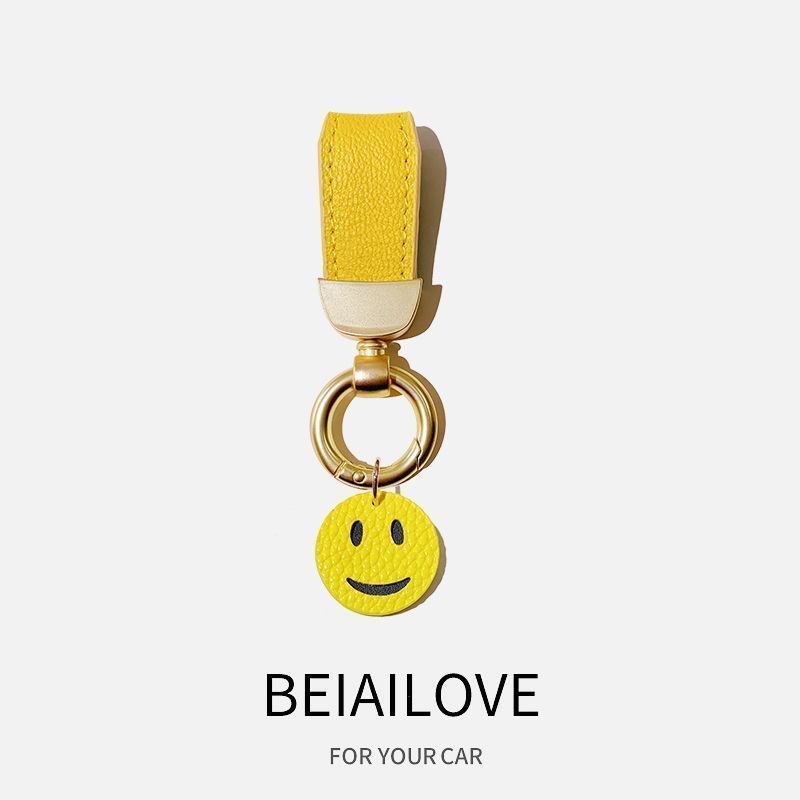 Estilo francés de alta gama de cuero fresco cuerda coche llavero simple lindo clave colgante Pequeño Libro Rojo mismo estilo girasol