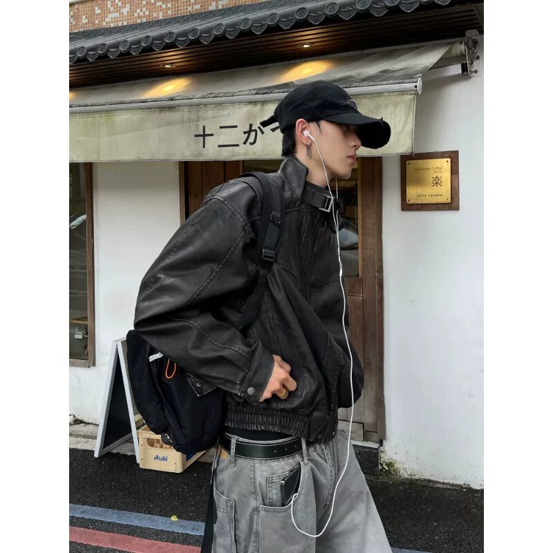 American retro loose-fitting distressed PU leather jacket for men and women, with a high-end, cool, short, wide stand-up collar and biker style American retro loose-fitting distressed PU leather jacket for men and women, with a high-end, cool, short, wide stand-up collar and biker style