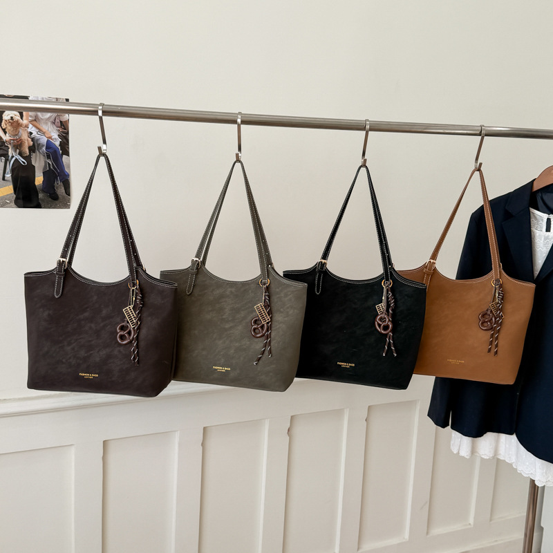 Bolsa de gran capacidad para mujeres 2026 nueva moda bolso de hombro de mujer alta textura versátil bolso de mujer de viaje mate