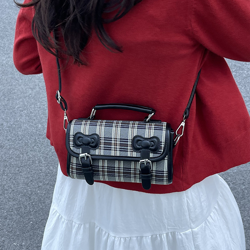2025 otoño y invierno nuevo estilo británico bolso de mano casual versátil bolso de hombro a rayas bolso de viaje coreano