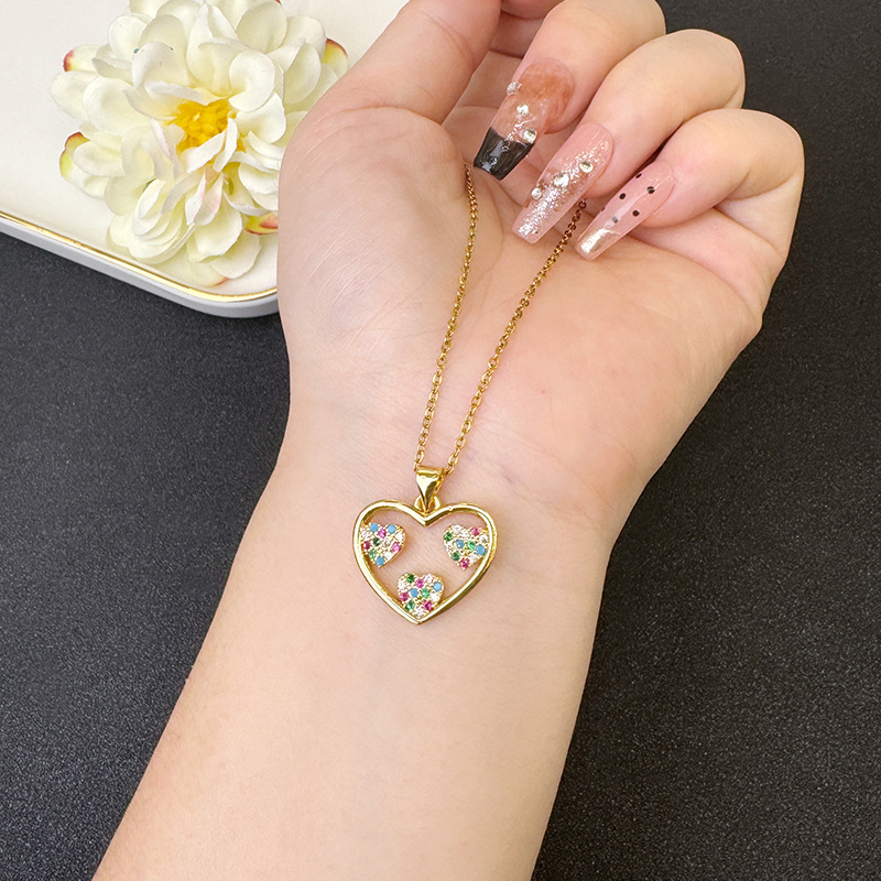 Pendientes de circón de amor hueco de oro de arena de Vietnam, femenino, diseño de nicho, personalidad, collar de temperamento, ventas directas de fábrica