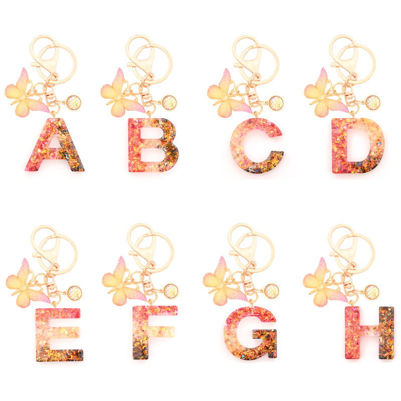 Retro Simple Style Letter Butterfly Resin Metal Women's Bag Pendant Keychain display picture 1