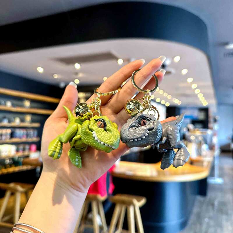 Trendy Pvc Cartoon Tyrannosaurus Rex Keychain Pendant Dinosaur Bell Claw Machine Hand-Biting Keychain Pendant