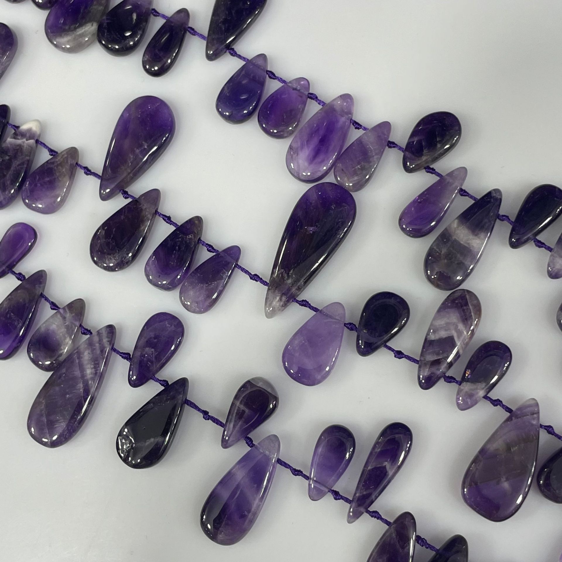 natural water with amethyst drop-shaped