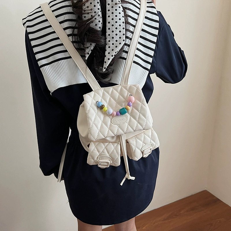 Small design cute backpack, shoulder bag with diamond pattern, trend of season