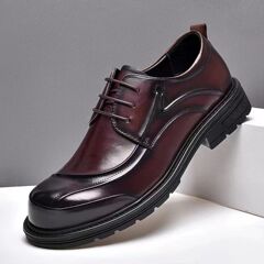 春夏の新型洞男靴本革ビジネスはカジュアルな透かし彫りの靴を履いています。