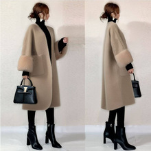 无领中长款贴袋两袖拼接皮毛大衣