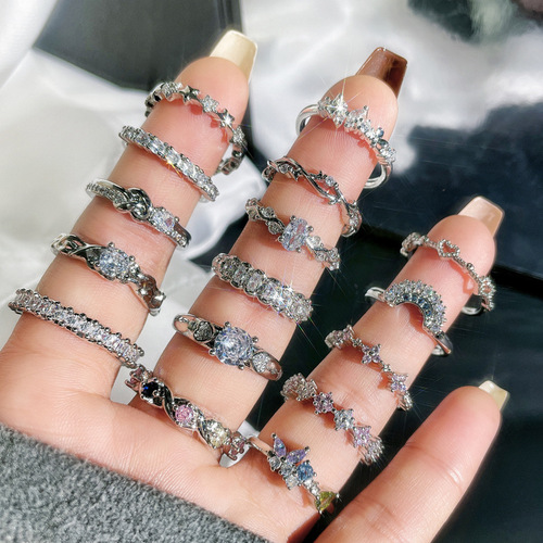 Delicate and small, minimalist open-mouthed ring with embedded zircons, unisex design, stackable and versatile fashion ring with a cool and indifferent style.