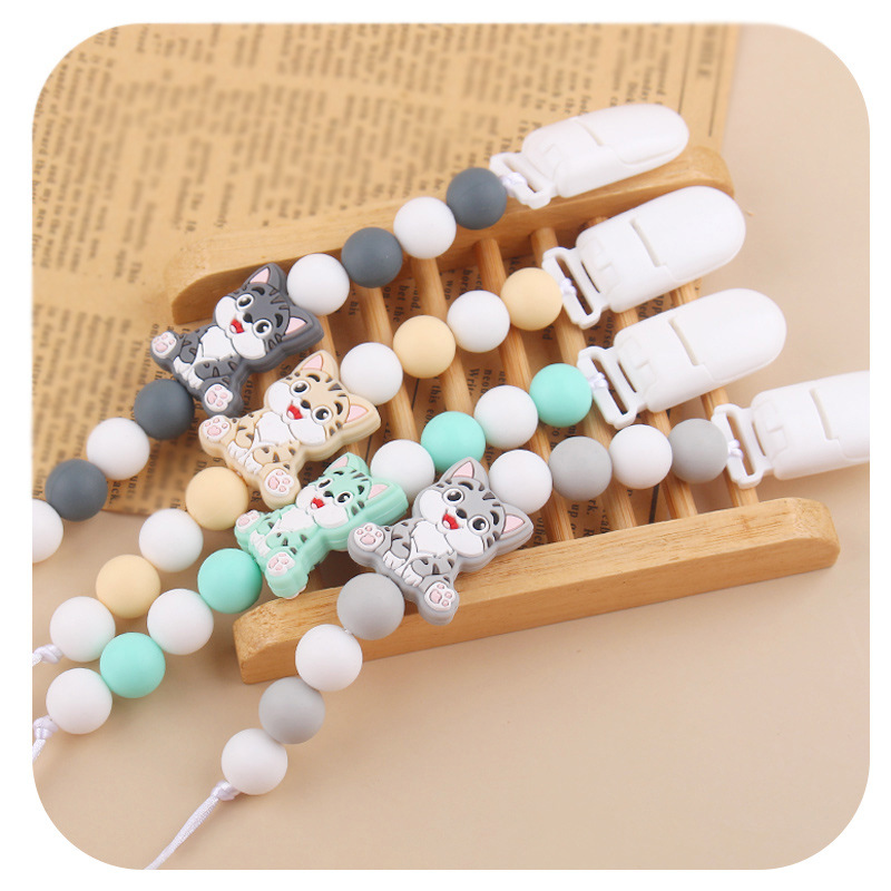 Amazon nuevo clip de pezón de plástico para bebés animados animales gatos calmar silicona bebé molar cadena de pezón