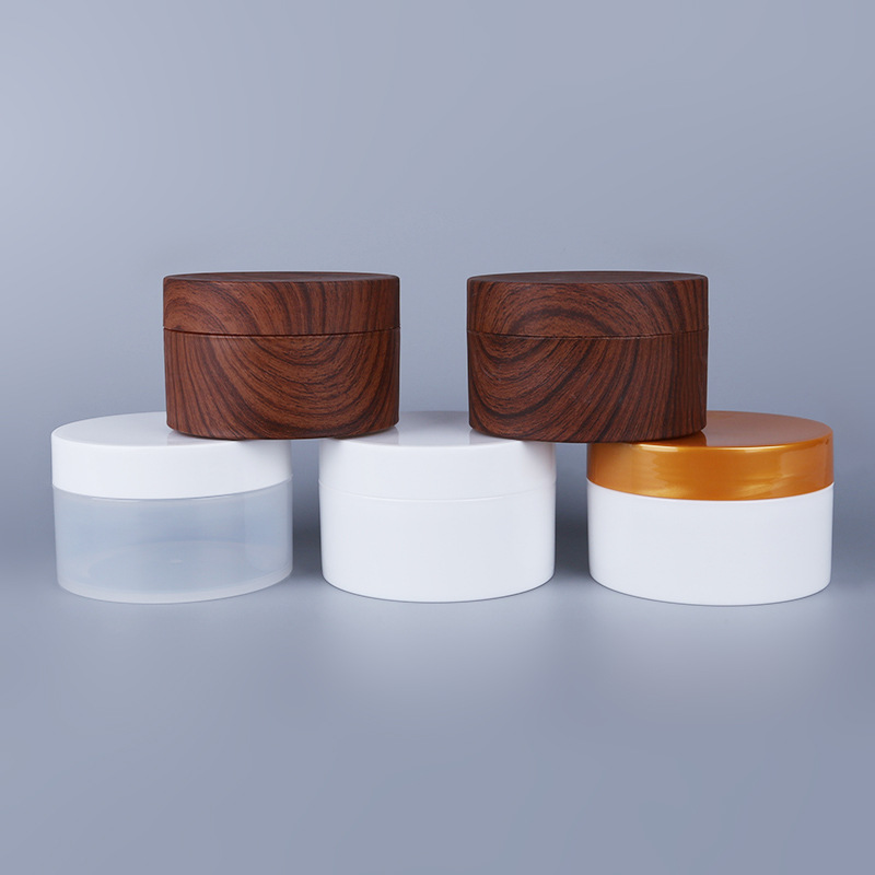 厂家供应300克磨砂膏瓶 塑料罐 带手拉片面膜瓶 发膜罐