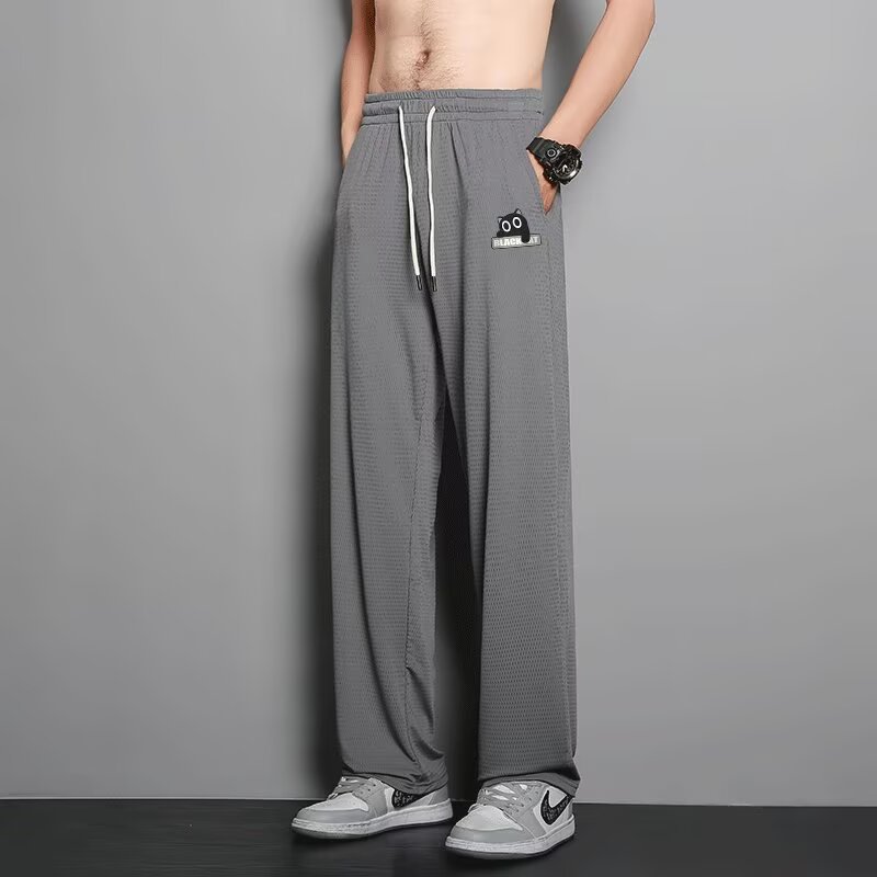Pantalones casuales delgados de verano, pantalones casuales de hombre, impresión negra, pantalones deportivos rectos de tamaño grande, 2025 nuevos