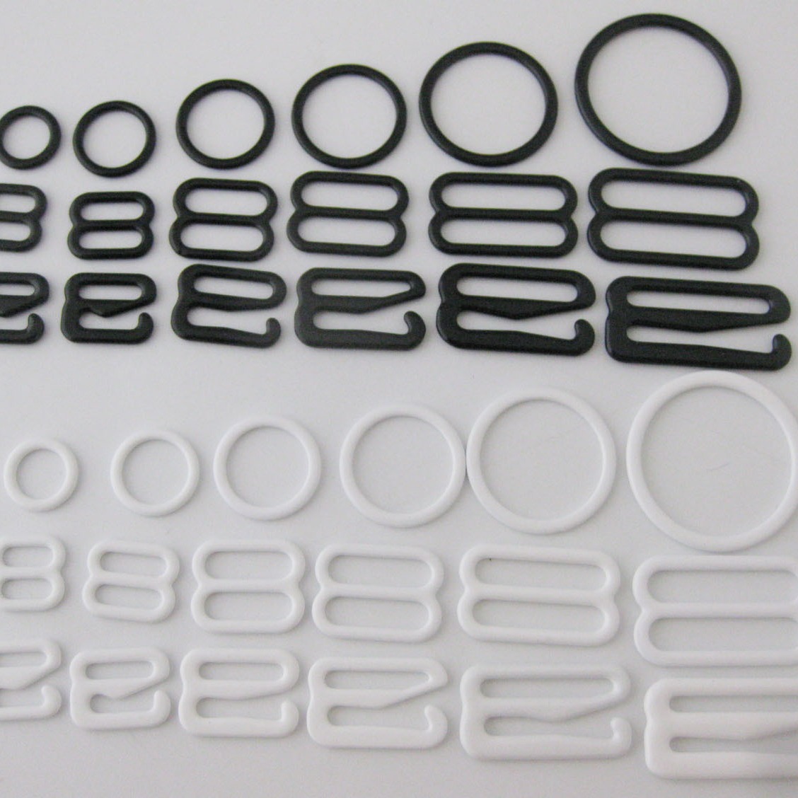 现货各种规格黑色白色包胶铁文胸扣 0/8/9 调节扣 泳衣内衣扣子