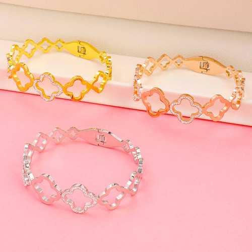 New four-leaf flower hollow spring buckle stainless steel bracelet golden geometric pattern splicing stainless steel bracelet jewelry
