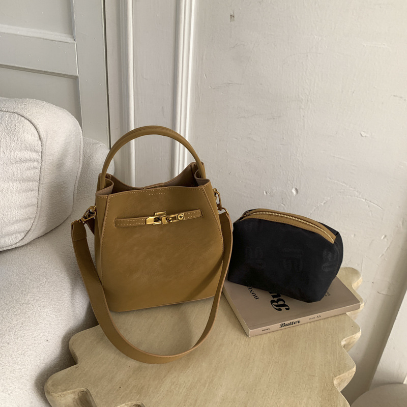 Super caliente canasta de platos de mano bolso de cubo de agua mujer venta caliente transfronteriza nuevo nicho coreano alto sentido versátil bolso mochila