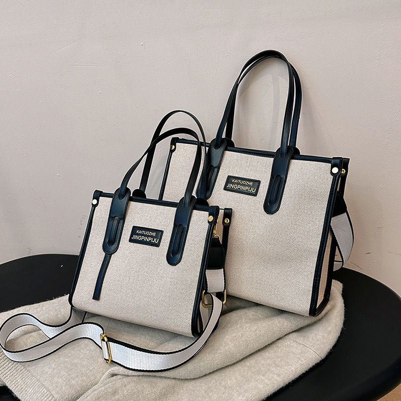 Bolso de mano de lona de color contrastante para mujer, nuevo estilo coreano transfronterizo, bolso de hombro tipo bandolera para ir al trabajo de alta gama