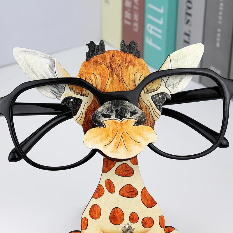 An interesting wooden yellow giraffe glasses stand, a creative and cute eyeglass display rack. This An interesting wooden yellow giraffe glasses stand, a creative and cute eyeglass display rack. This