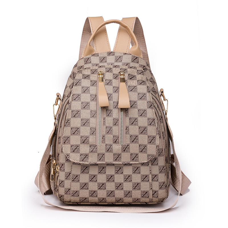 Comercio exterior al por mayor 2023 nueva mochila de cuero suave para mujer a cuadros moda contraste color viajes al aire libre mochila marea