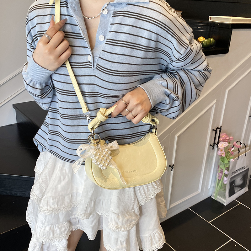 Bolso de nicho francés para mujer 2025 nuevo bolso de hombro casual de todo fósforo de moda bolso de silla de mensajero de estilo occidental