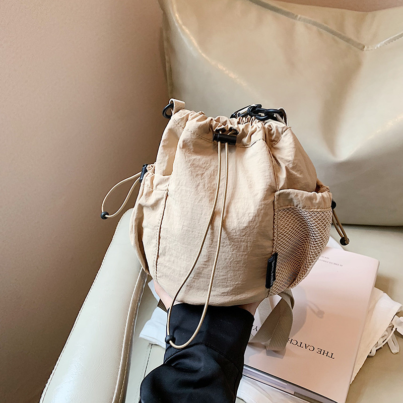 New shoulder bag ins nylon bucket bag for women with high-end feel, large capacity casual drawstring shoulder bag_voghion.com