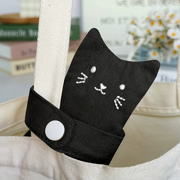 Cute and Adorable Cat Storage Bag, Hanging Pouch for Coins, Keys, and Earphones, Can Be Used as a Cat Keychain