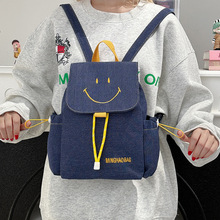 初秋新款高颜值多巴胺笑脸图案背包女轻便通勤百搭大容量双肩包