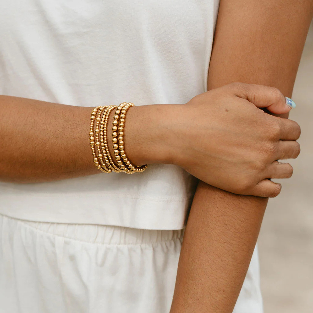 Amazon venta caliente pulsera de cuentas de oro real pulsera elástica galvanizada simple Europa y América 5 piezas conjunto de pulsera de cuentas