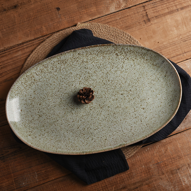 Transfronterizos exclusivos para cubiertos de hotel retrógrados grandes platos de cerámica de alto valor familiar platos de pescado al vapor elípticos