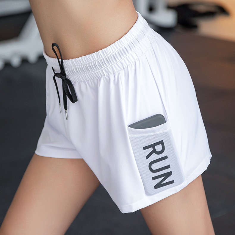 Pantalones cortos deportivos femeninos sueltos anti-vagabundo gimnasio entrenamiento para correr delgado pantalones casuales de yoga de cintura alta verano