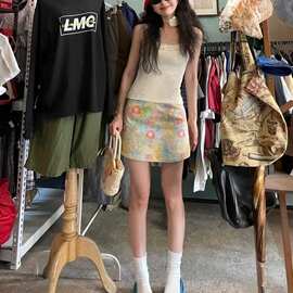 绿色女修身包臀裙2026小个子高腰显瘦a字短裙碎花半身裙早秋新款