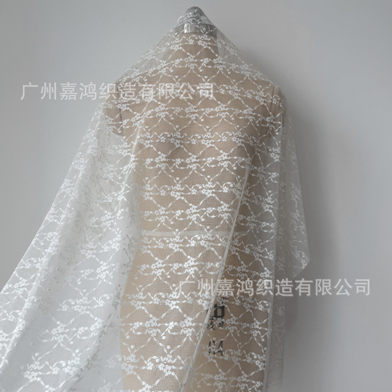 Tejido de encaje elástico jacquard tridimensional para hacer falda, vestido de perspectiva, falda elástica, albaricoque blanco y negro en stock