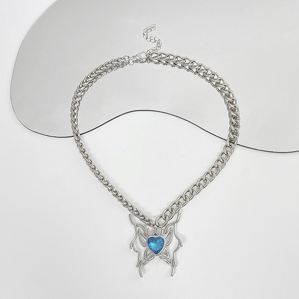 Juego de collar y pendientes mariposa con cristal corazón azul_voghion.com
