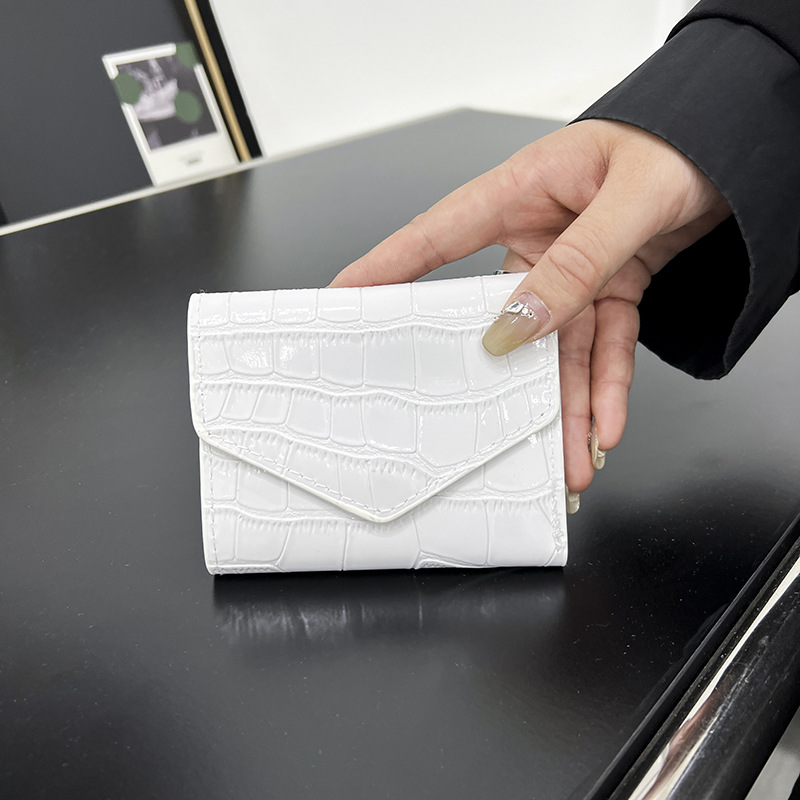 Personalidad textura casual tendencia simple bolsas de cena de color sólido de mujeres lápiz labial de moda de color sólido impresión bolsa de mano universal