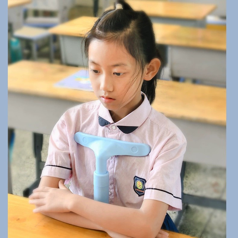 子供の座り方矯正器小学生の字を書く姿勢の宿題は近視を予防して神器を直して視力を勉強します。