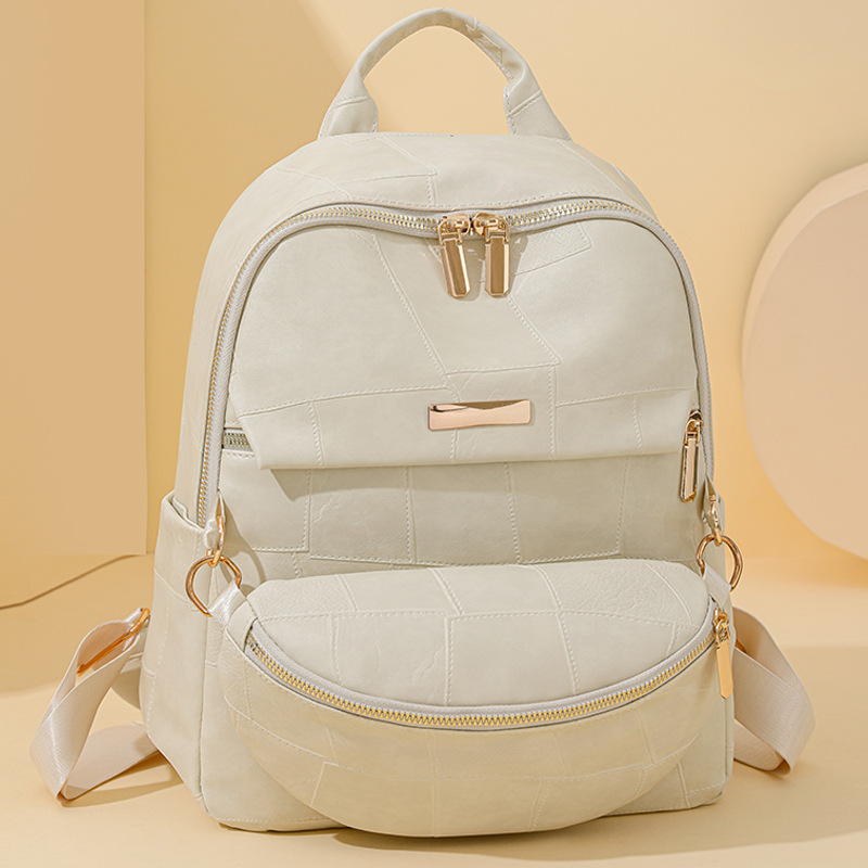 2024 nueva mochila de cuero suave para mujer, simple y versátil, de gran capacidad, mochila de viaje al aire libre al por mayor