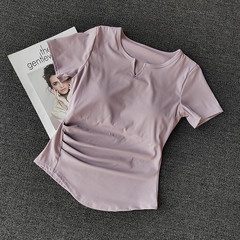 デザインされた半袖胸パッド付きヨーロッパとアメリカのスポーツTシャツ、女性用ランニングフィットネスストレッチアウターウェア痩身トップヨガウェア