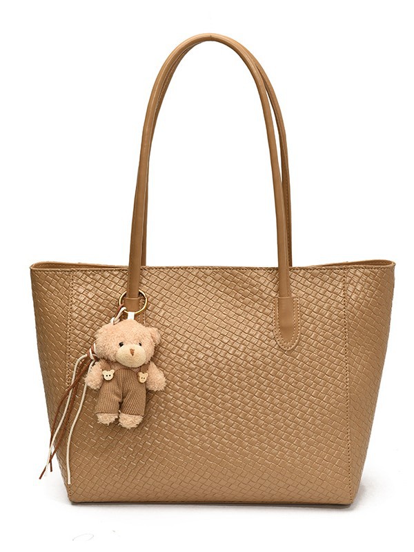 Bolsa de moda retro de gran capacidad para mujeres 2025 nueva bolsa de hombro transfronteriza simple textura casual bolso de abrigo