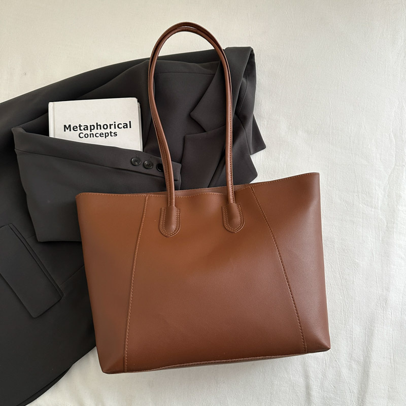 Bolsa de mano de textura de viaje casual otoño / invierno 2024 nuevo estilo coreano simple bolso de hombro axilar temperamento bolso especial