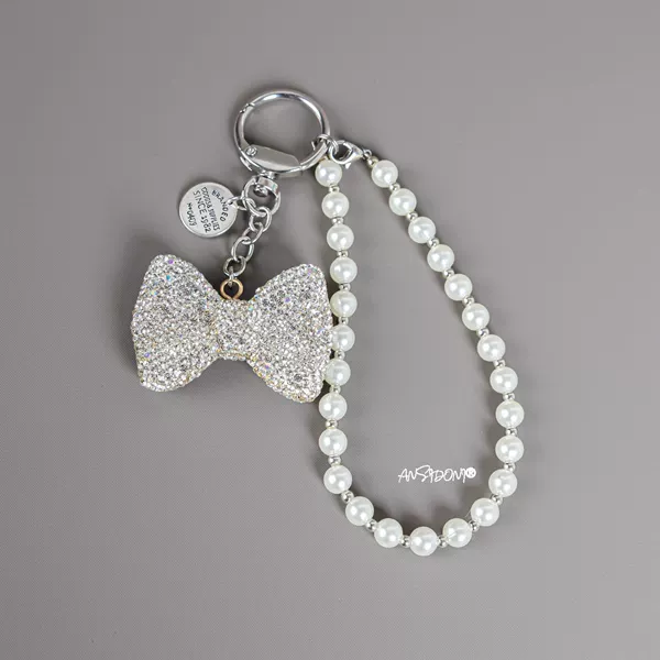With bow, from pearl, diamond encrusted