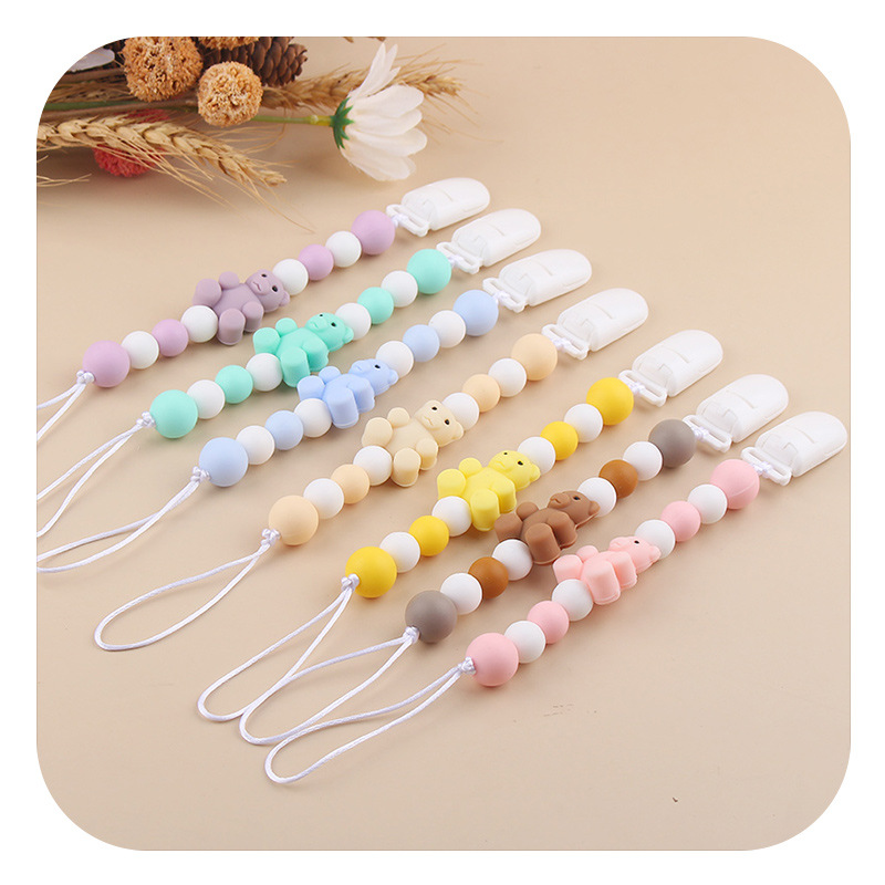 Amazon nueva cadena de tetas de silicona para bebés y bebés, cadena de dientes de molar para calmar la cadena de goma de diente anti-caída